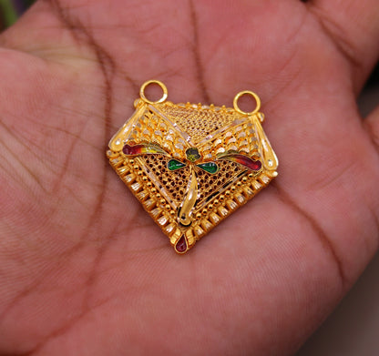 22KT yellow gold handmade filigree pendant from TRIBAL ORNAMENTS, intricate Indian wedding and party jewelry design.