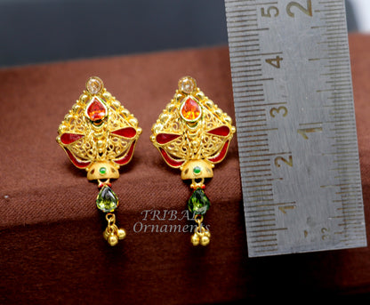 Handmade 22kt yellow gold traditional stud earring with intricate filigree work, showcasing ethnic jewelry craftsmanship.