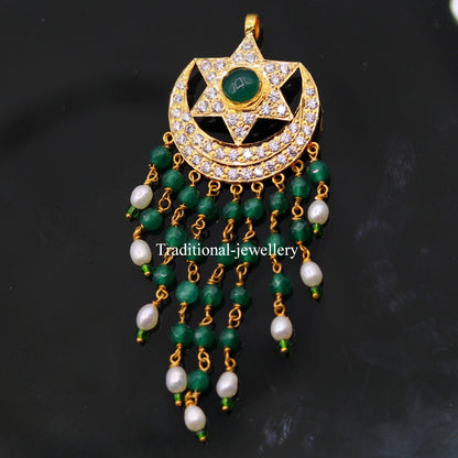 22KT yellow gold handmade vintage Jadau moon and star pendant on a designer drop necklace with intricate stone work.
