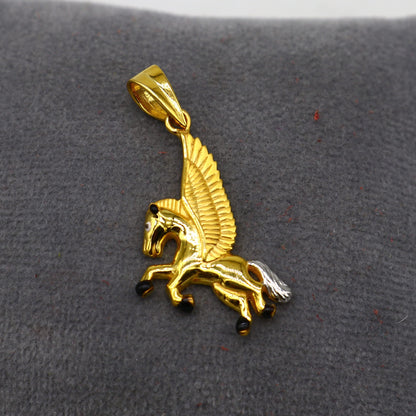 22KT yellow gold handmade Pegasus unicorn pendant by TRIBAL ORNAMENTS, featuring intricate design and elegant jewelry craftsmanship.