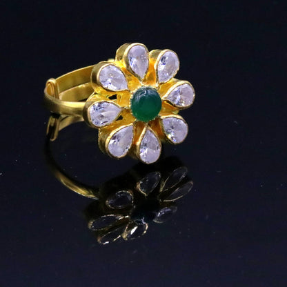 22KT yellow gold handmade adjustable flower-shaped ring by TRIBAL ORNAMENTS, featuring simple, hallmarked Indian jewelry design