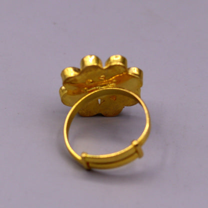 22KT yellow gold handmade flower-shaped adjustable ring by TRIBAL ORNAMENTS, featuring simple elegant Indian jewelry design.