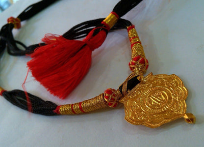 22KT yellow gold handmade Shree Nathji tribal pendant from Rajasthan, showcasing antique ethnic jewelry design with intricate craftsmanship.