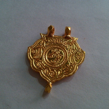 22KT yellow gold handmade tribal pendant featuring Shree Nathji design, antique ethnic jewelry from Rajasthan by TRIBAL ORNAMENTS.