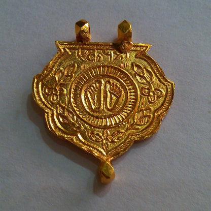 22KT yellow gold handmade tribal pendant featuring Shree Nathji design, antique ethnic jewelry from Rajasthan by TRIBAL ORNAMENTS.