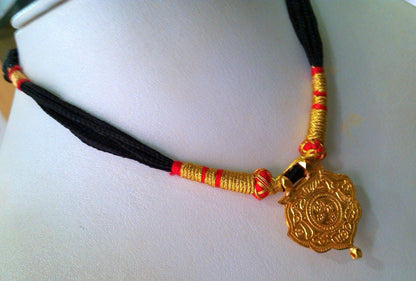 22KT yellow gold handmade tribal pendant featuring Shree Nathji design, antique ethnic jewelry from Rajasthan, India.
