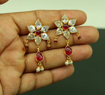 22Kt yellow gold handmade bridal stud earrings with hanging pearls, stylish wedding jewelry, crafted by TRIBAL ORNAMENTS.