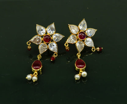 22Kt yellow gold handmade bridal stud earrings with hanging pearls, stylish wedding jewelry, crafted by TRIBAL ORNAMENTS.