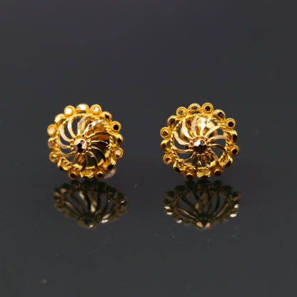 22Kt yellow gold handmade filigree stud earrings with intricate design, modern solid gold jewelry from Indian ethnic craftsmanship.