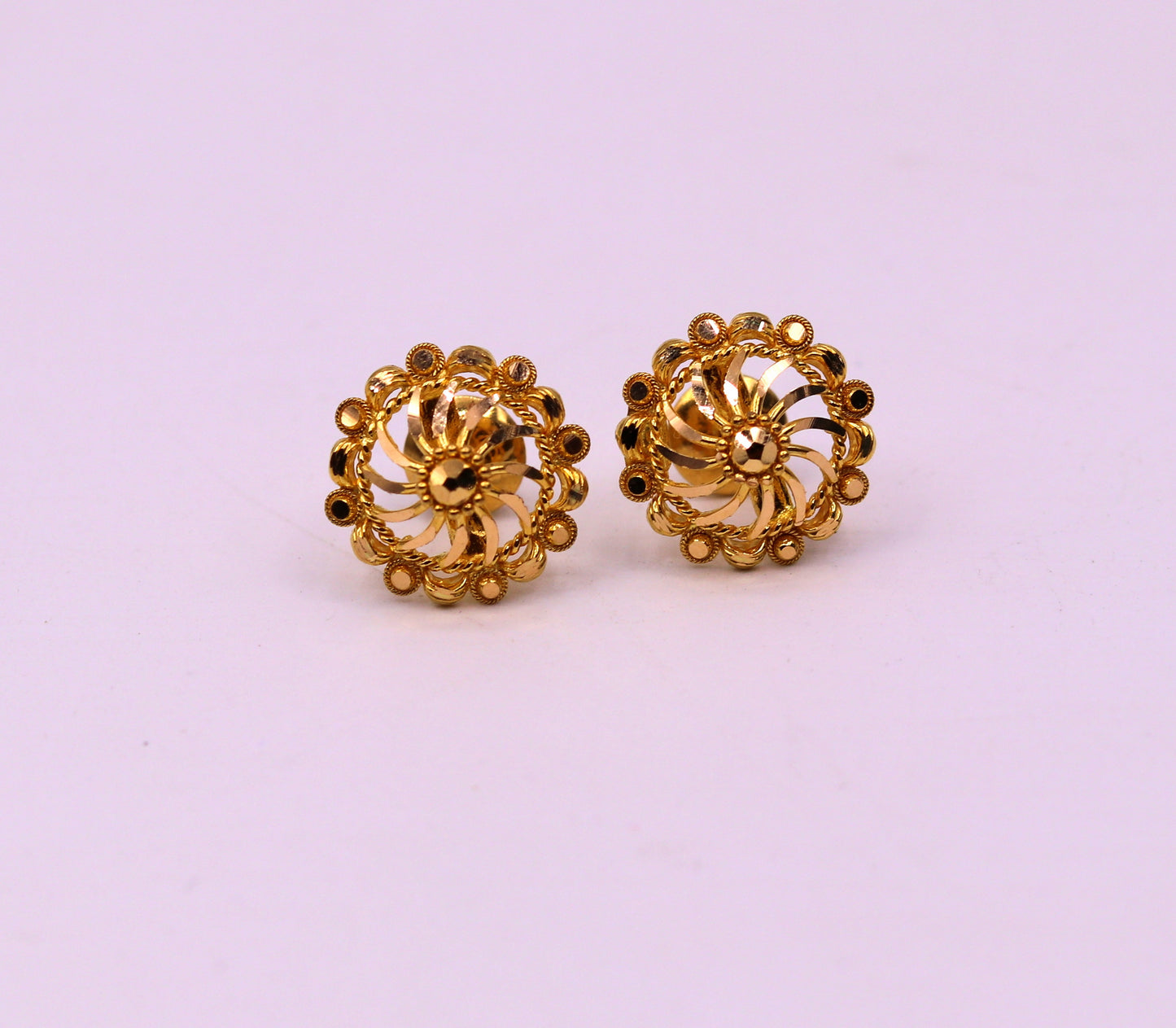 22Kt yellow gold handmade filigree stud earrings showcasing intricate Indian ethnic design and modern solid gold jewelry style.