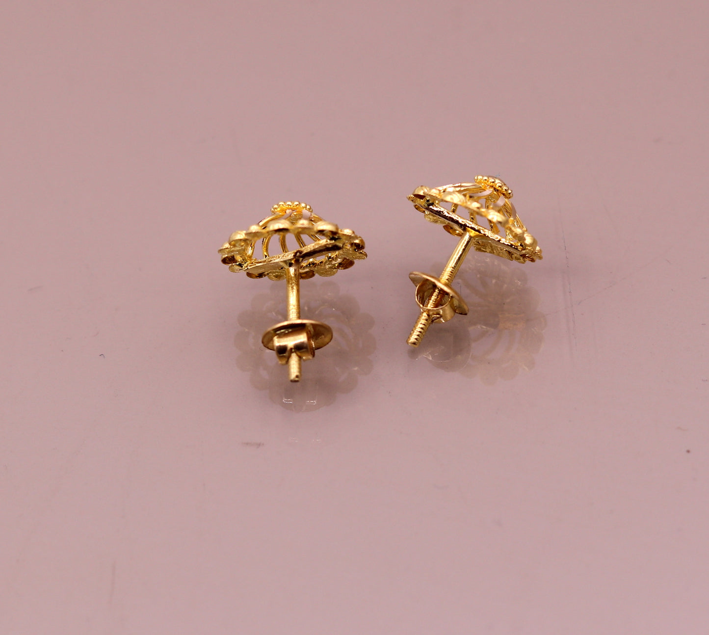 22Kt yellow gold handmade filigree stud earrings featuring intricate ethnic Indian design and modern solid gold jewelry style.