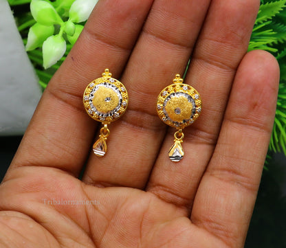 22KT yellow gold handmade designer stud earrings by TRIBAL ORNAMENTS, featuring elegant, stylish jewelry for daily wear or bridal gift.
