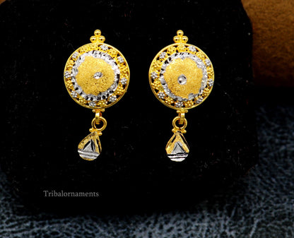 22KT yellow gold handmade designer stud earrings by TRIBAL ORNAMENTS, stylish and elegant jewelry for daily wear or bridal gift.