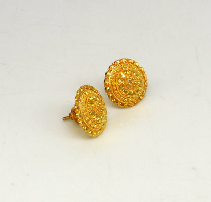 22Kt yellow gold handmade filigree stud earrings by TRIBAL ORNAMENTS, showcasing intricate craftsmanship for bridal jewelry.