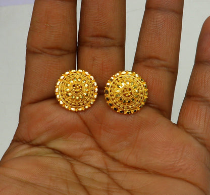 22Kt yellow gold handmade filigree stud earrings from TRIBAL ORNAMENTS, featuring intricate traditional craftsmanship.