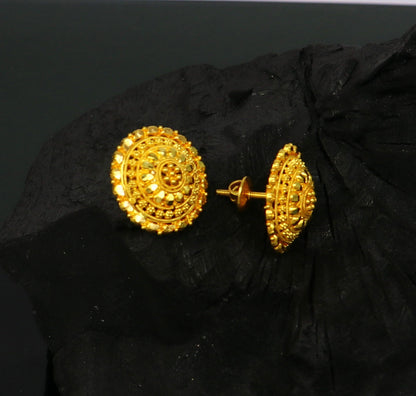 22Kt yellow gold handmade filigree stud earrings by TRIBAL ORNAMENTS, featuring intricate design for bridal jewelry and gifts.