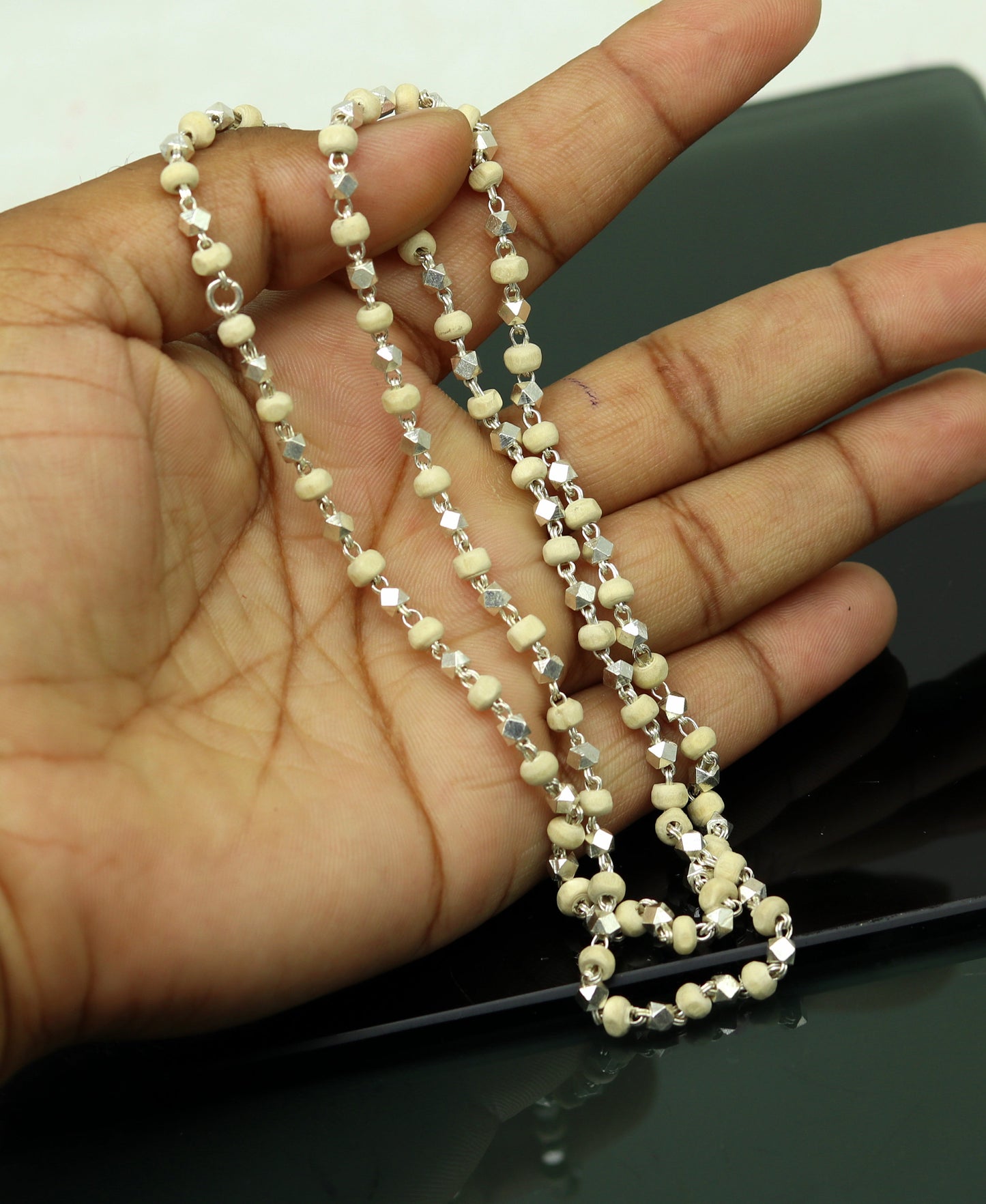 Handmade 24-inch sterling silver basil rosary beads with wooden beads on a silver chain, unisex tulsi mala necklace.