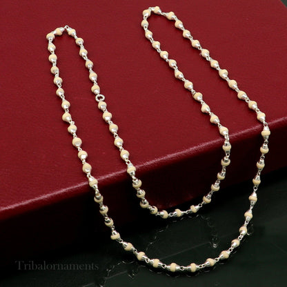 Unisex 24-inch sterling silver rosary necklace with handmade wooden beads and Holy basil accents, tribal-inspired jewelry.