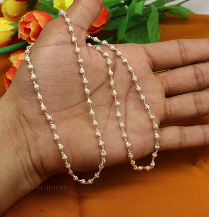 Unisex 24-inch sterling silver rosary necklace with handmade wooden holy basil beads and silver chain, tribal-inspired jewelry.