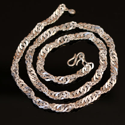 24-inch solid sterling silver Cuban link chain necklace from Tribal Ornaments, showcasing a sleek, handmade jewelry design.
