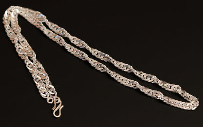 24-inch solid sterling silver Cuban link chain necklace from TRIBAL ORNAMENTS, showcasing a sleek, handmade jewelry design.