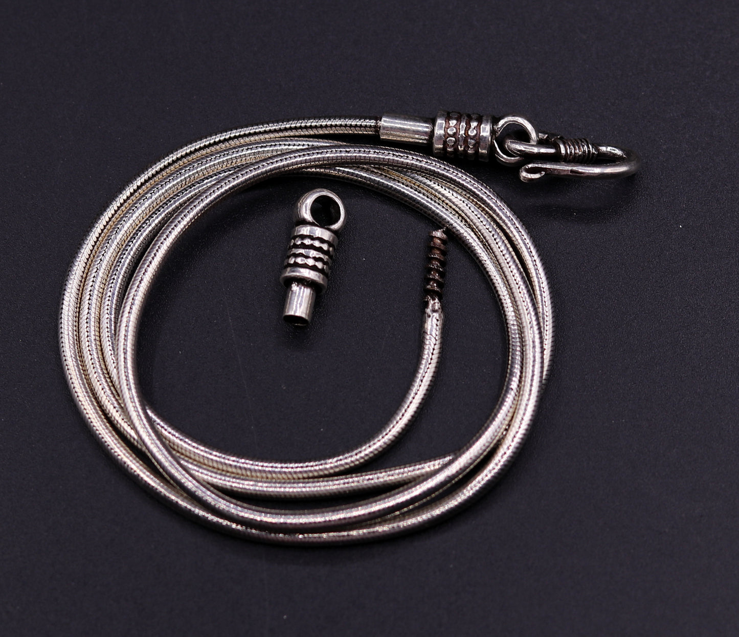 28-inch sterling silver snake chain necklace by TRIBAL ORNAMENTS with vintage screw design and oxidized finish, suitable for pendants.