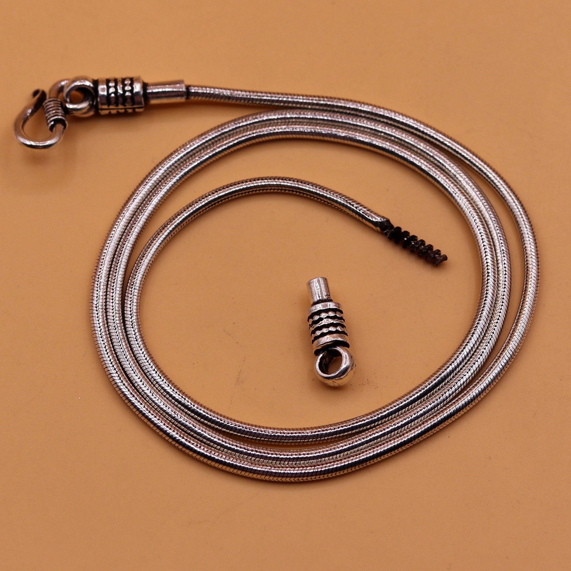 28-inch sterling silver snake chain necklace by TRIBAL ORNAMENTS with vintage screw design and oxidized finish for pendants
