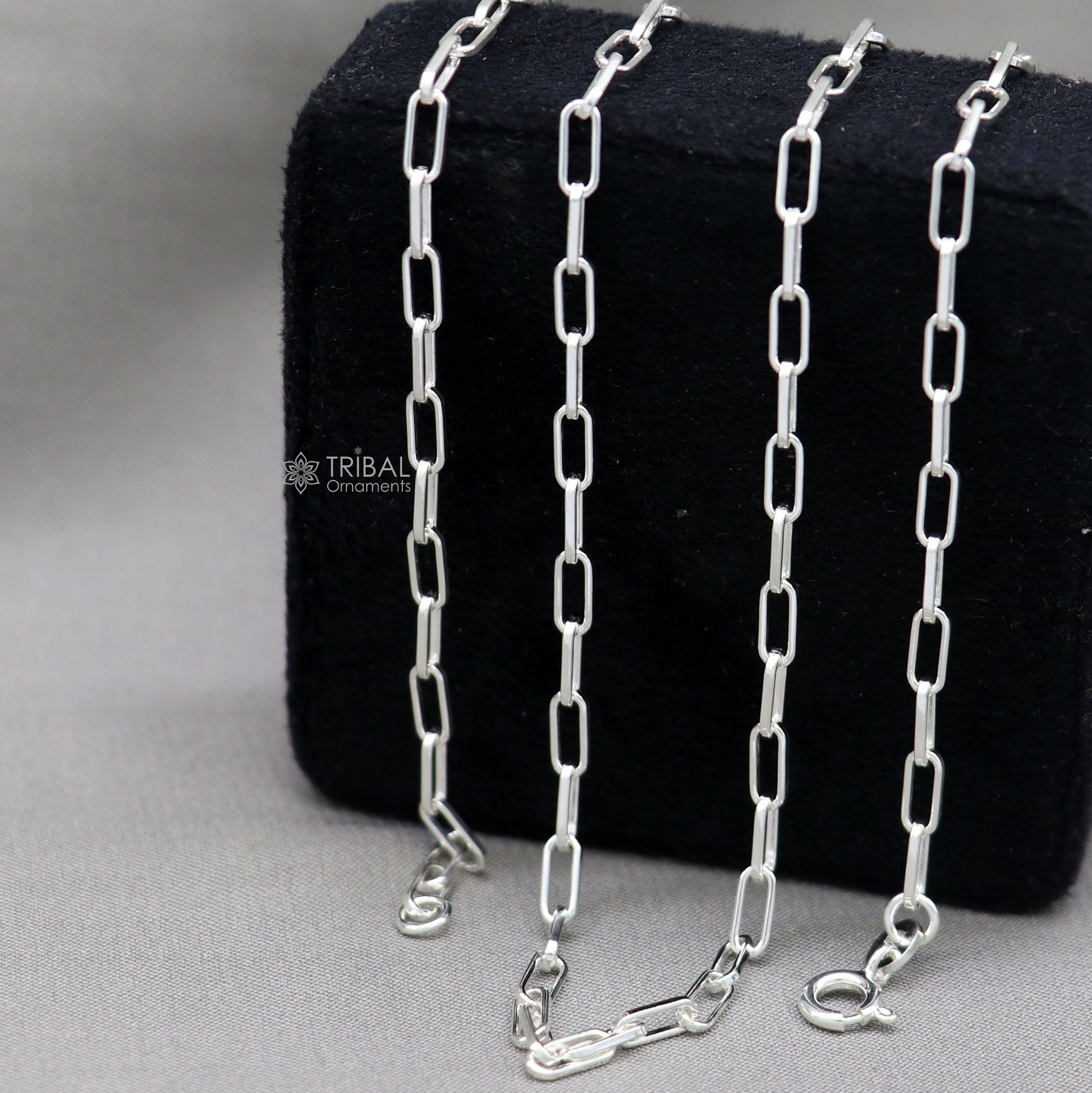 Sterling silver 18-inch paperclip chain necklace by Tribal Ornaments, stylish handmade jewelry with a fancy design, ideal for gifting.
