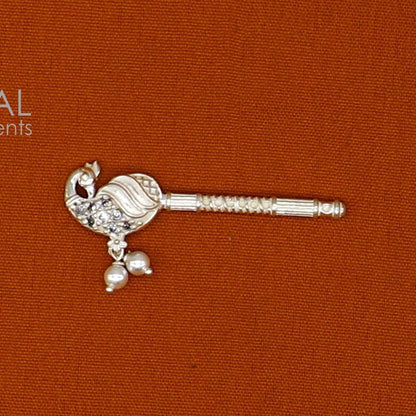 Handmade 3.5cm sterling silver Krishna flute with peacock design, featuring Laddu Gopala and Gopala idol craftsmanship.