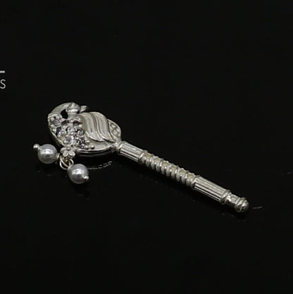 Handmade 3.5cm sterling silver Krishna flute with peacock design, featuring Laddu Gopala idol, crafted by TRIBAL ORNAMENTS.
