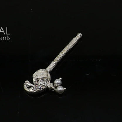 Handmade 3.5cm sterling silver Krishna flute with peacock design, featuring Laddu Gopala idol, crafted by TRIBAL ORNAMENTS.