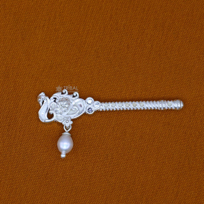 Handmade 3.5cm sterling silver Krishna flute with peacock design, featuring Laddu Gopala idol, crafted by TRIBAL ORNAMENTS.