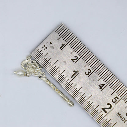 Handmade 3.5cm sterling silver Krishna flute with peacock design, featuring Laddu Gopala and Gopala idol motifs.