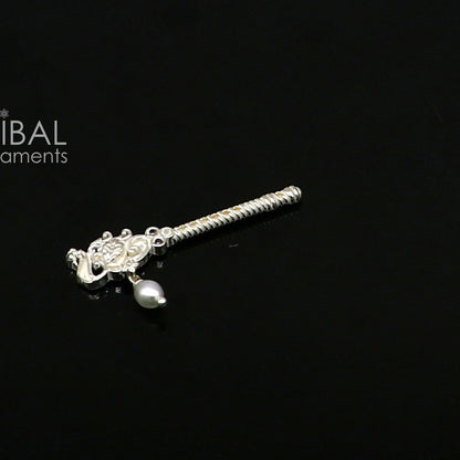 Handmade 3.5cm sterling silver Krishna flute with peacock design, featuring Gopala idol and traditional bansuri style.