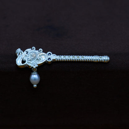 Handmade 3.5cm sterling silver Krishna flute with peacock design, featuring idol Gopala and laddu motifs, crafted by Tribal Ornaments.