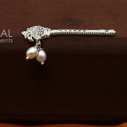 Handmade 3cm sterling silver Krishna flute with kalash design, featuring intricate details and traditional bansuri style.