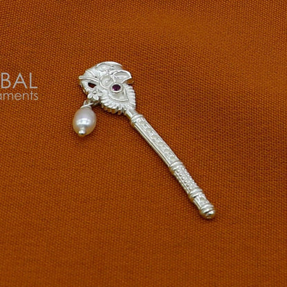 Handmade 3cm sterling silver Krishna flute with peacock design, featuring laddu Gopala motif, crafted by Tribal Ornaments.