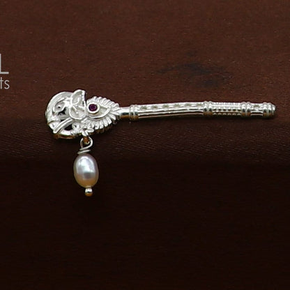 Handmade 3cm sterling silver Krishna flute with peacock design, featuring laddu Gopala idol and intricate details, crafted by Tribal Ornaments.