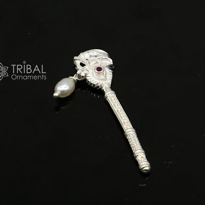 Handmade 3cm sterling silver Krishna flute with peacock design, featuring idol Gopala and traditional bansuri style.