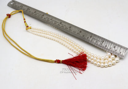 Tribal Ornaments 312-carat freshwater pearl necklace set with 4-9mm three-line layered design, perfect for weddings or daily wear.