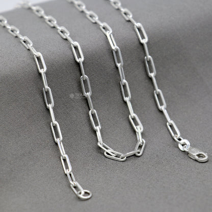 Sterling silver 3mm 20-inch stylish link chain necklace by TRIBAL ORNAMENTS, showcasing its intricate design and elegant craftsmanship.