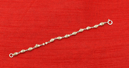 Sterling silver handmade basil rosary beads necklace for Lord Krishna statues, featuring intricate craftsmanship by TRIBAL ORNAMENTS.