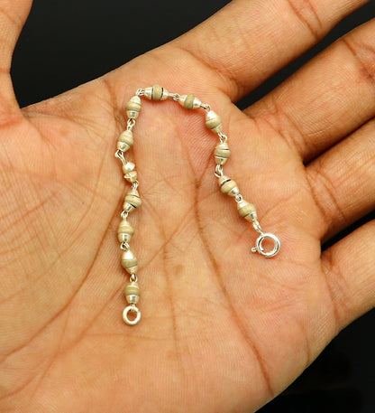 Handmade 925 sterling silver basil rosary beads necklace for Lord Krishna statues, featuring intricate craftsmanship and small size.