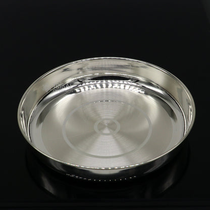 Handmade 4-inch 999 fine silver tray and baby set with silver utensils, ideal for gifting and puja rituals by Tribal Ornaments.