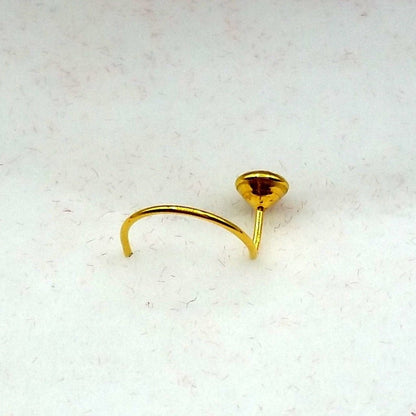 18k gold nose pin with white stone, simple design from Tribal Ornaments, showcasing a sleek and elegant jewelry piece.
