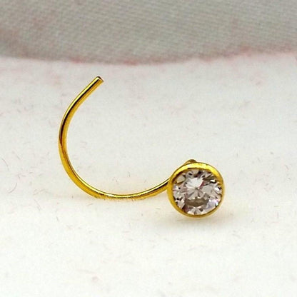 18k gold nose pin with white stone, simple design by TRIBAL ORNAMENTS, featuring a 4mm size, traditional Indian jewelry style.
