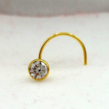 18k gold nose pin with white stone from Tribal Ornaments, simple design, 4 mm size, traditional Indian jewelry.