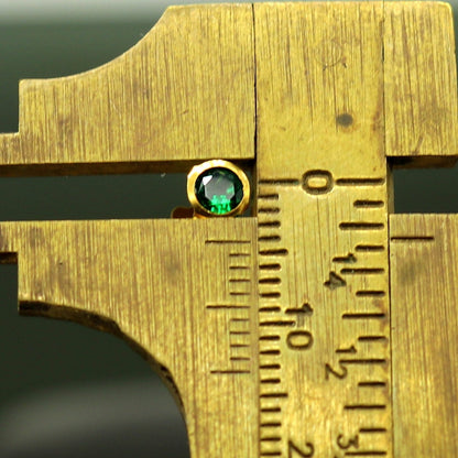 Handmade 4mm 18k yellow gold stud earrings with vibrant green cubic zirconia, vintage design, unisex jewelry by Tribal Ornaments.
