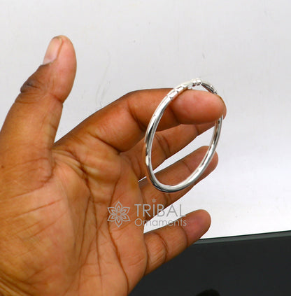Silver 4mm 925 sterling handmade bangle bracelet with shiny finish, adjustable unisex design from Tribal Ornaments.