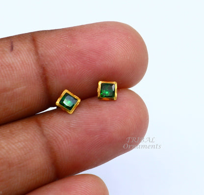 18kt yellow gold handmade square-shaped stud earring with green gemstone, screw-back design, suitable for ear or nose jewelry.